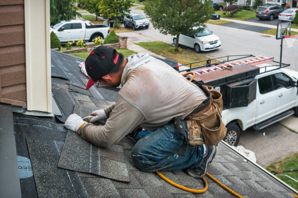 Professional Roofing technician working in Naples, ME